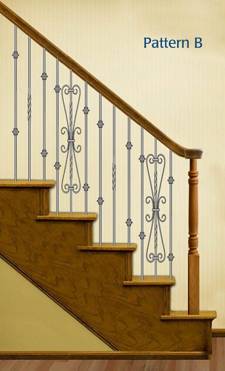 Wrough iron stair balusters with custom design
