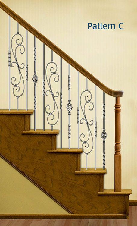 Wrought iron stair balusters with complex design