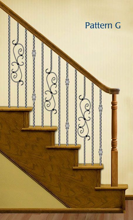 Wrought iron stair balusters with complex patterns