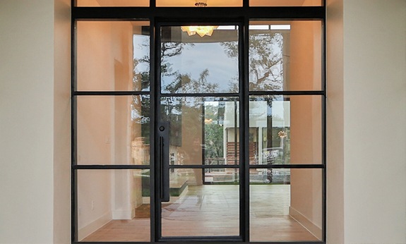 Large glass pannel front entrance into a home