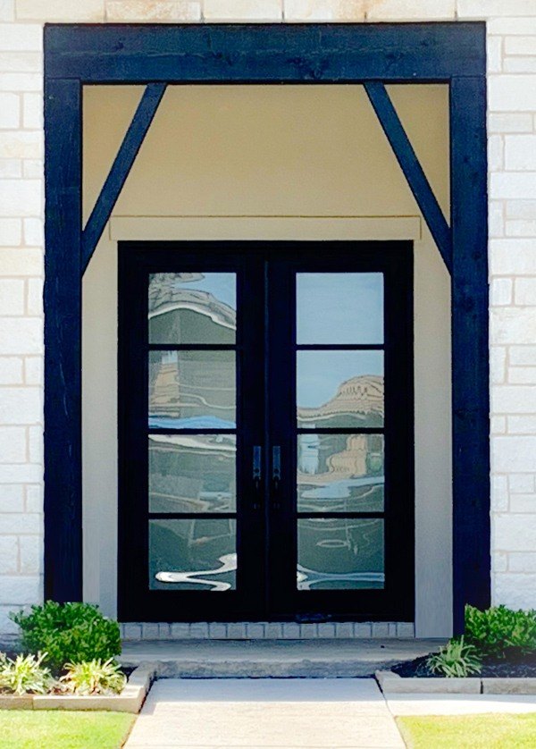 Minimalistic double front door with square top and black finish