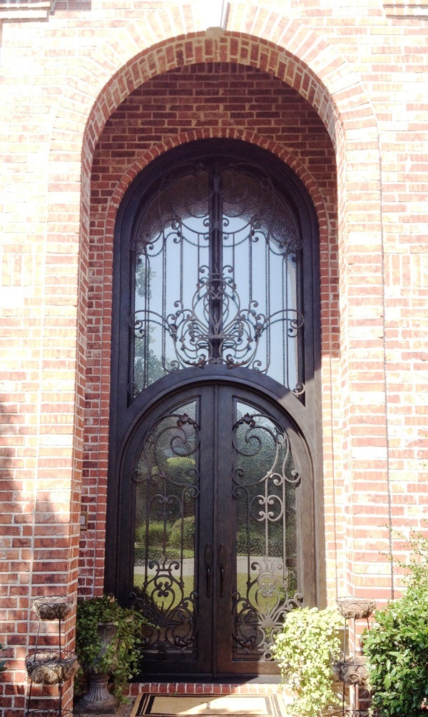 Round top double doors with black iron finish