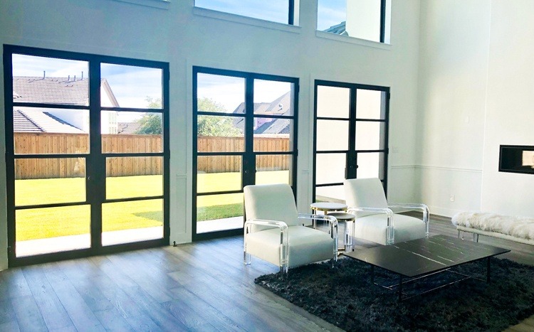 Row of three black finish square top iron double doors