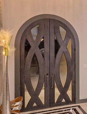 Round  top iron double doors with copper finish