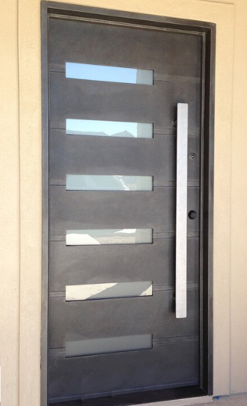 Black finish iron door with large metal door pull