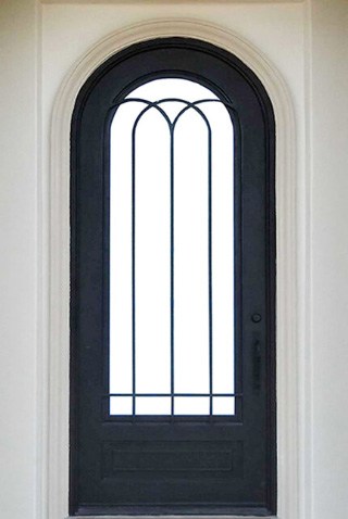 Round top iron front door with simple iron pattern over window