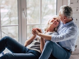 Homeowners enjoying newly installed replacement windows