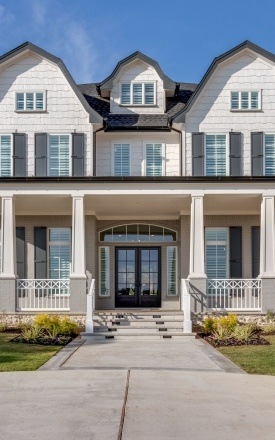 Front view of home with energy efficient replacement windows