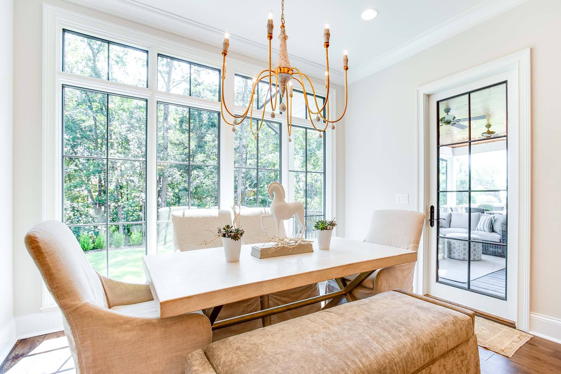 Dining room with large wall of windows