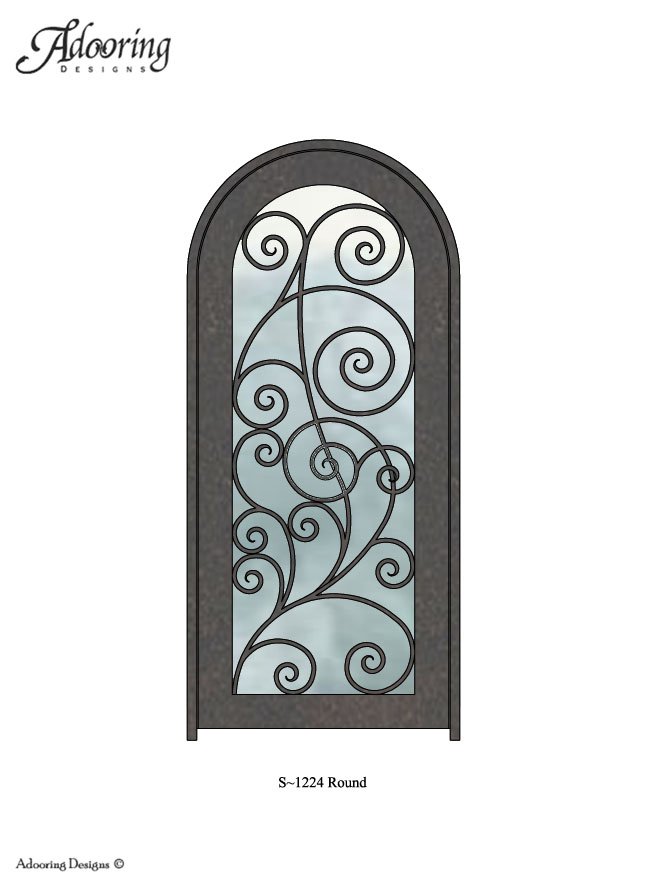 Intricate ironwork pattern over large window in Round top door