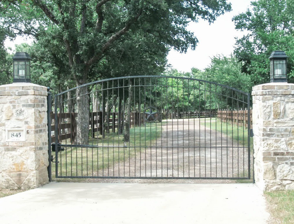 Complex design iron driveway gate