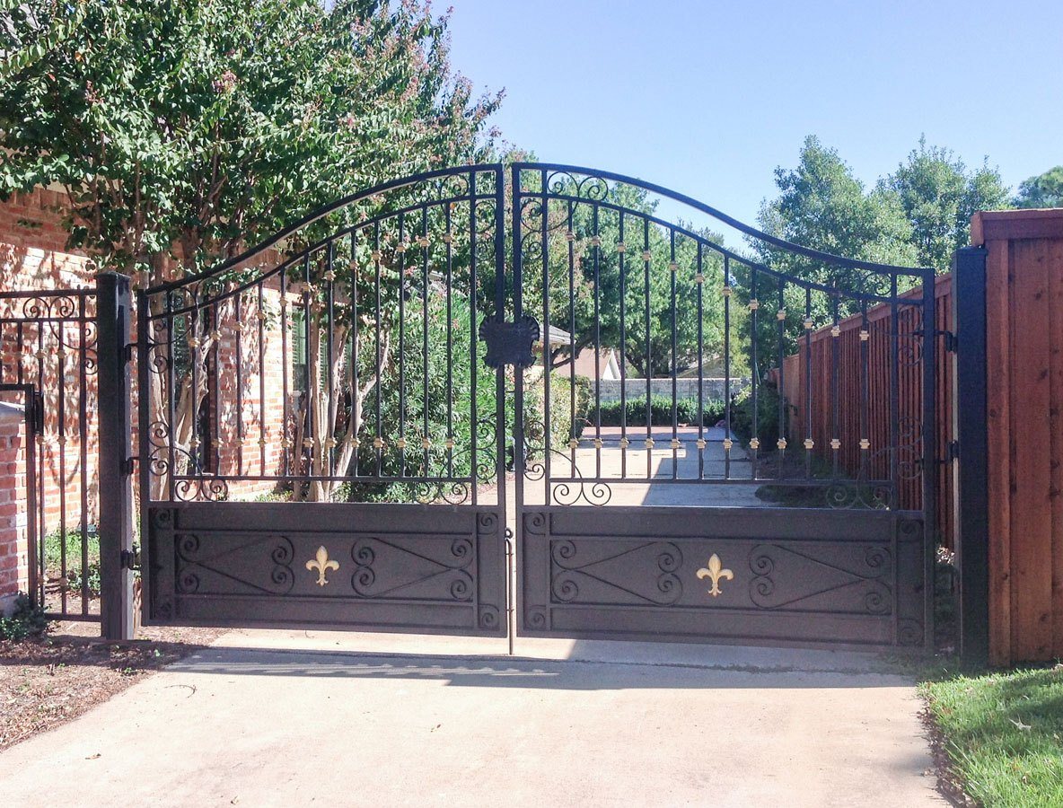 Intricate design iron driveway gate