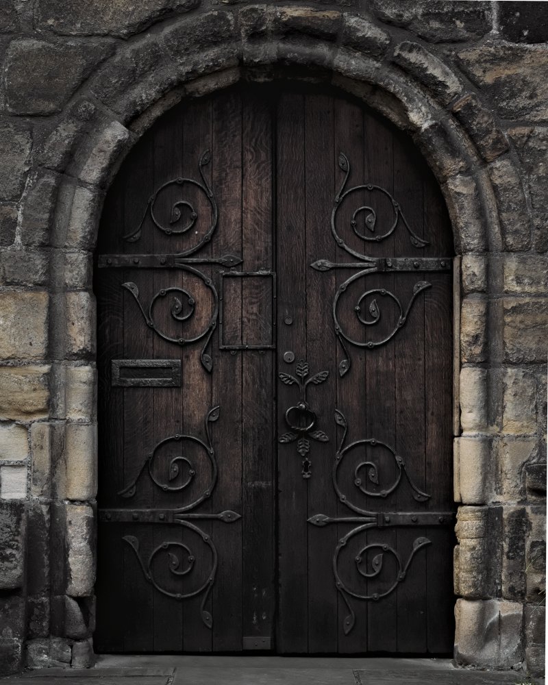 An image of older wrought iron doors