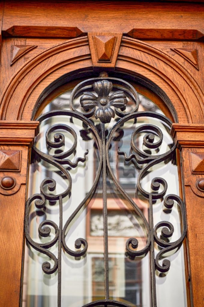 An image of older wrought iron doors