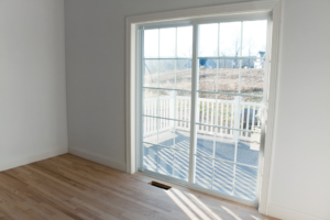 a closeup of an exterior sliding patio door 